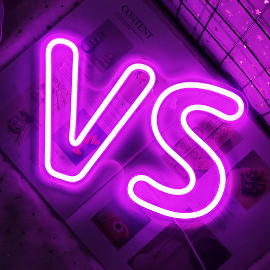 "VS"