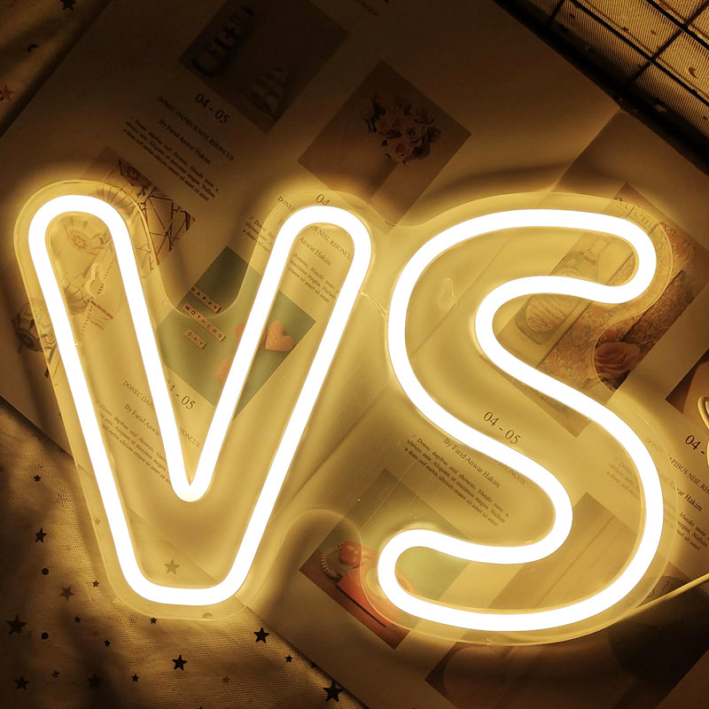 "VS"